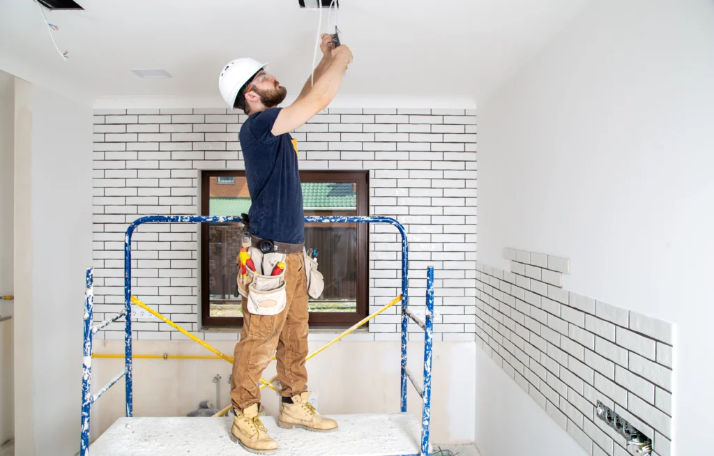 professional overalls with tools background repair site home renovation concept