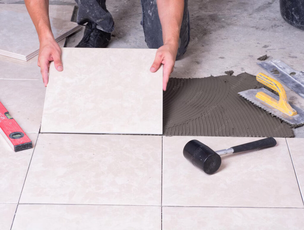 tiler installing ceramic tiles floor 996271 2376